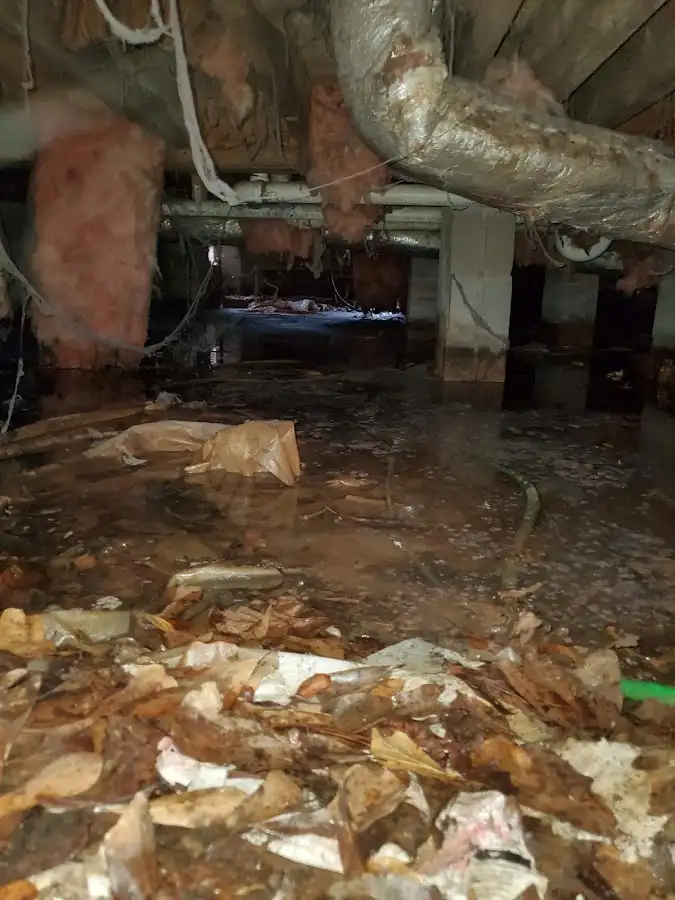 Crawl space flood assessment for Commercial Water Damage Restoration in Watford City